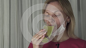 Woman drinking effervescent antipyretics pill dissolved in glass of water. Health care slow motion stock footage video
