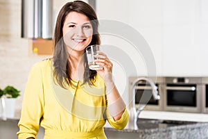 Woman drinking filtered woman