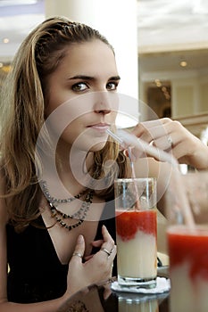Woman Drinking Florida Juice Cocktail