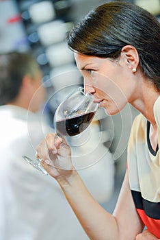 Woman drinking glass red wine