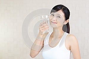 Woman drinking a glass of water