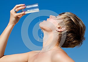 Woman drinking a glass of water