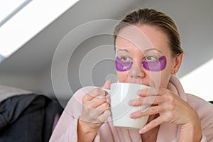 Woman drinking her morning coffee