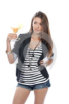 Woman drinking margarita cocktail