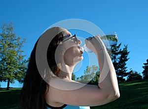 Woman drinking mineral water