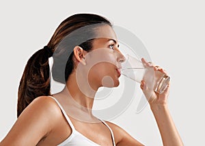 Woman drinking mineral water