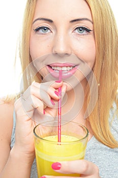 Woman drinking orange juice