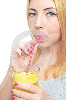 Woman drinking orange juice