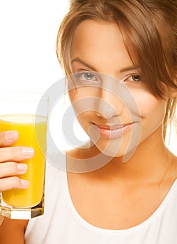 Woman drinking orange juice close up