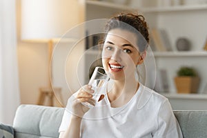 Woman drinking pure water