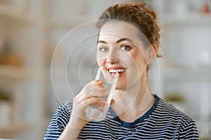 Woman drinking pure water