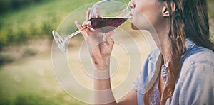 Woman drinking red wine