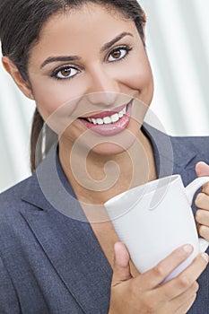 Woman Drinking Tea or Coffee