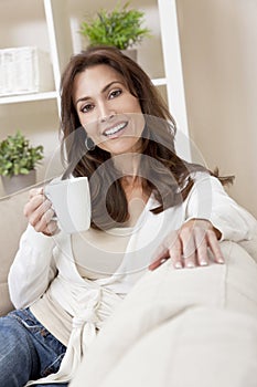 Woman Drinking Tea or Coffee at Home