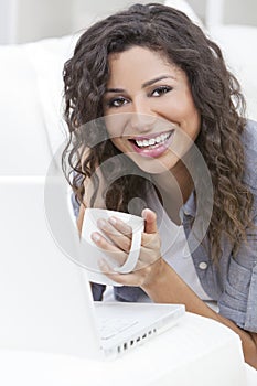 Woman Drinking Tea Coffee Using Laptop Computer