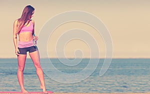 Woman drinking water after sport gym outdoor