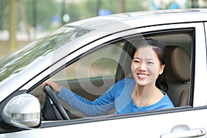 Woman driver driving a car