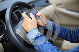 Woman driver use cell phone driving car