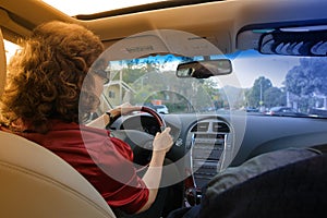 Woman driving car photo