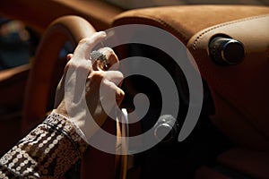 Woman driving car, Hand hold steering wheel, close-up