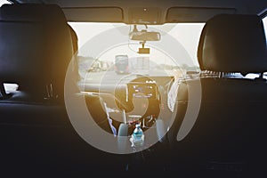 woman driving car and passenger on front seat