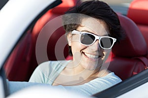 Woman Driving a Convertible