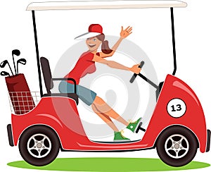 Woman driving a golf cart photo