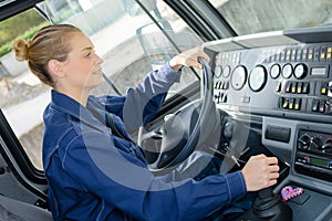 Woman driving heavy goods vehicle