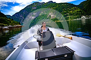 Woman driving a motor boat