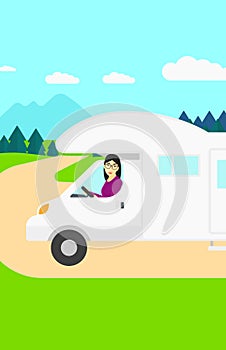 Woman driving motor home.