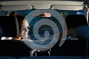 Woman driving on reverse