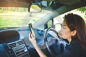 Woman driving astray photo