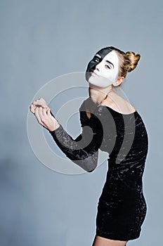 Woman with dual greasepaint