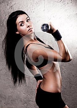Woman with a dumbbell