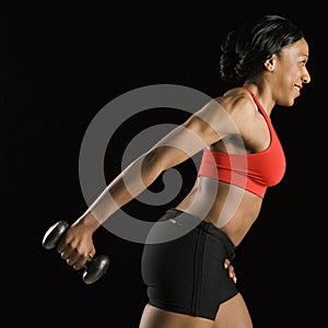 Woman with dumbbell