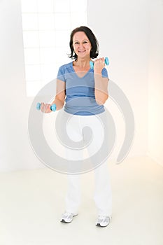 Woman with dumbbell