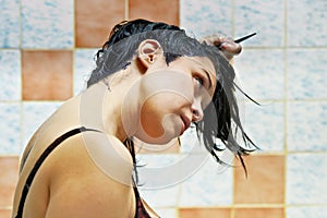 Woman dyeing hairs photo