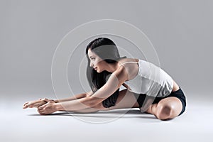 Woman in dzany sirshasana yoga position