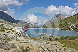 Woman on e-bike in the Engadin, Switzerland