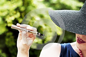 Woman with e-cigarette