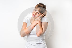Woman with earache is holding her aching ear