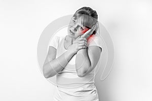 Woman with earache is holding her aching ear photo