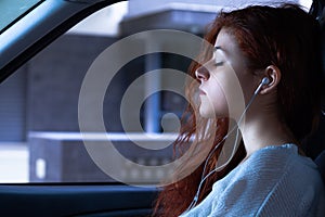 Woman with Earbuds