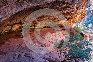 Woman on early morning hike on the Zion Canyon Overlook Trail, Zion National Park, Utah, USA.