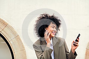 woman with earphones enjoys making a video call