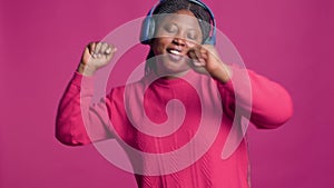 Woman with earphones having a good time