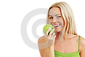 Woman eat green apple