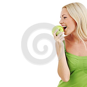 Woman eat green apple