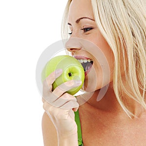 Woman eat green apple