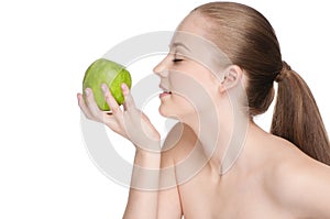 Woman eat green apple